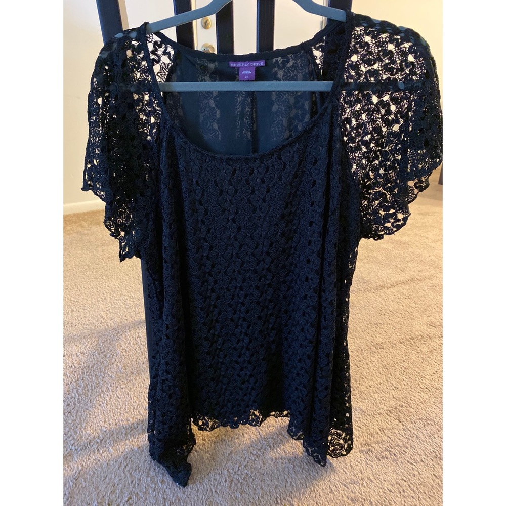Woman’s Black Lace Top